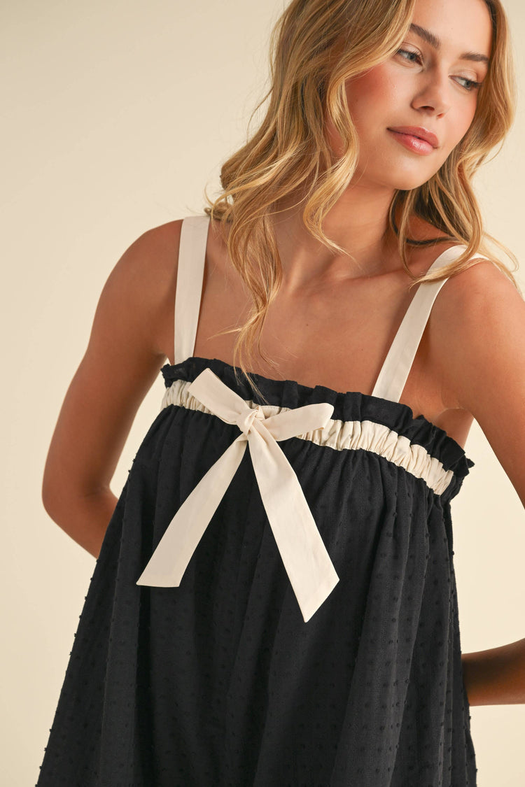 RELAXED FIT FLOWY ROMPER WITH FRONT BOW DETAIL