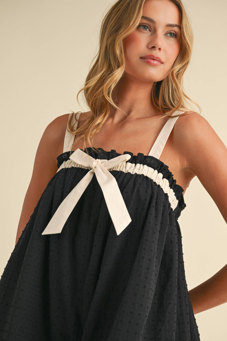 RELAXED FIT FLOWY ROMPER WITH FRONT BOW DETAIL