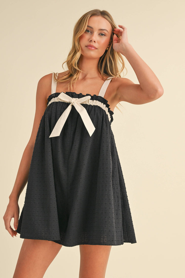 RELAXED FIT FLOWY ROMPER WITH FRONT BOW DETAIL