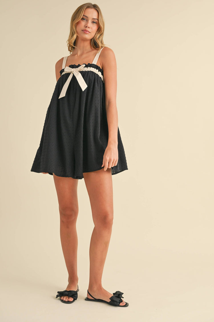 RELAXED FIT FLOWY ROMPER WITH FRONT BOW DETAIL