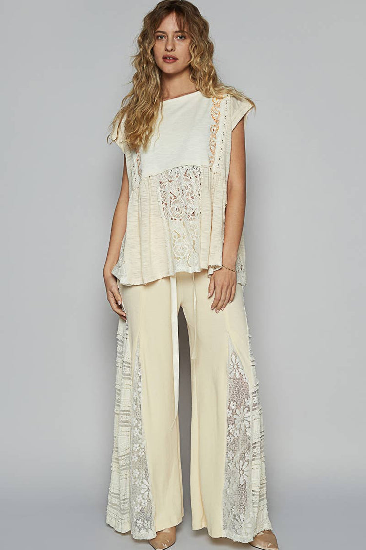 Boat neck solid embroidery textured knit top