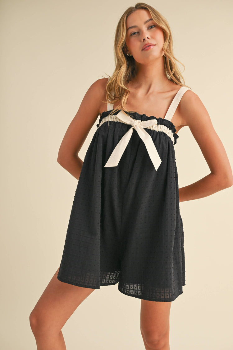 RELAXED FIT FLOWY ROMPER WITH FRONT BOW DETAIL