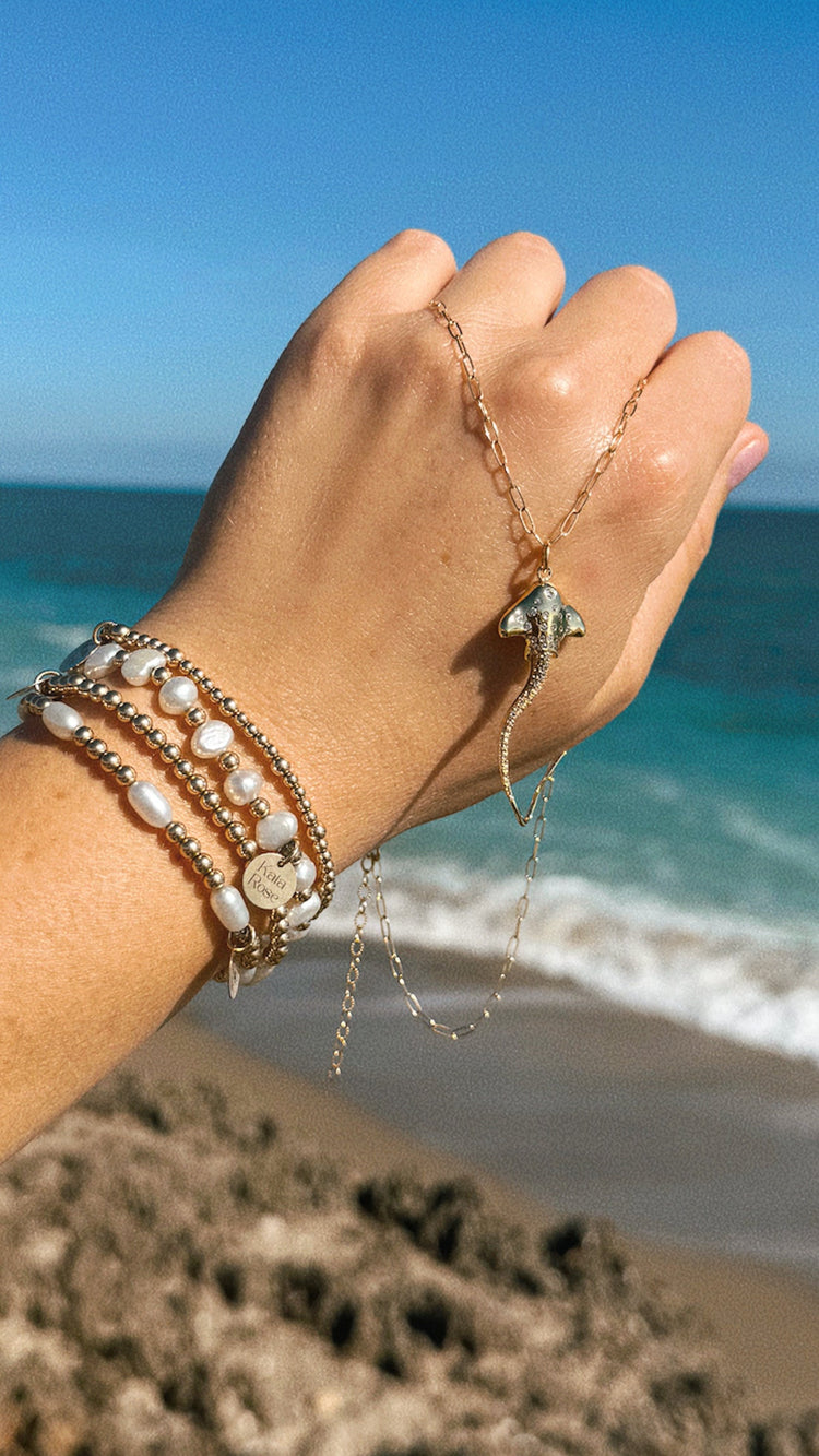 Hihimanu Spotted Eagle Ray Gold Charm Necklace on Hand