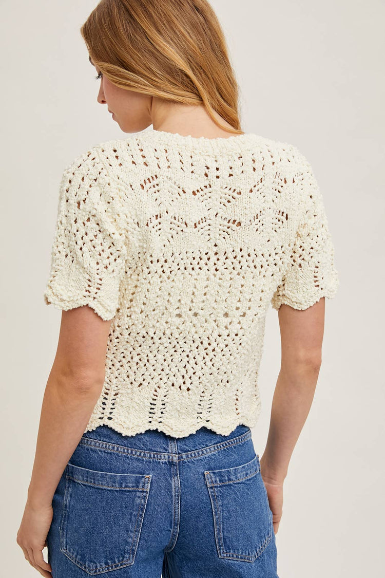 SHEER KNIT SWEATER WITH SCALLOPED HEM BOTTOM