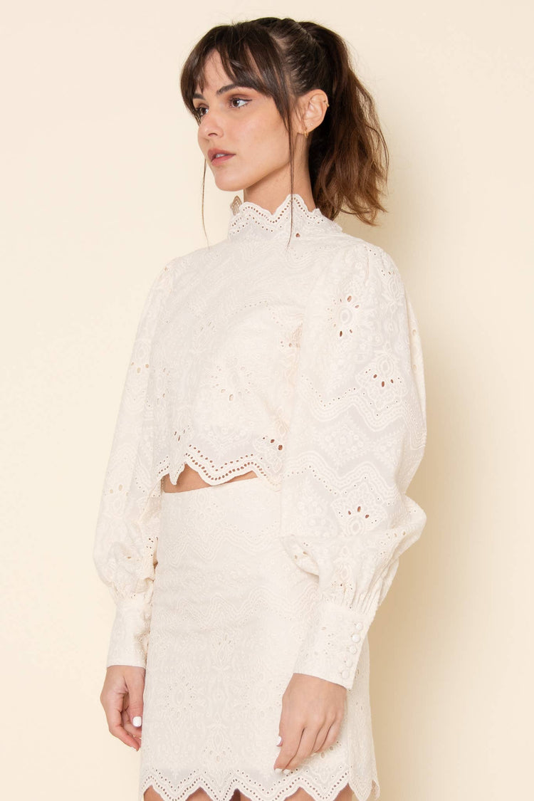 MOCK EMBROIDERED PATTERN BACK ZIP CROP TOP