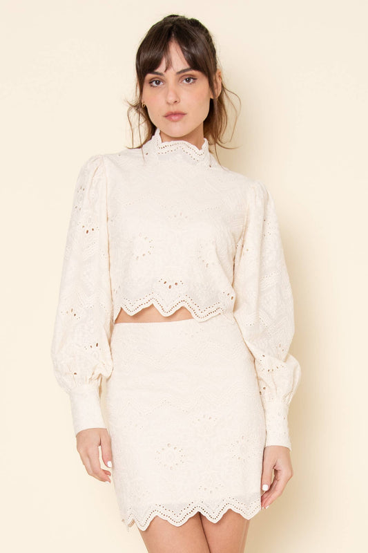 MOCK EMBROIDERED PATTERN BACK ZIP CROP TOP