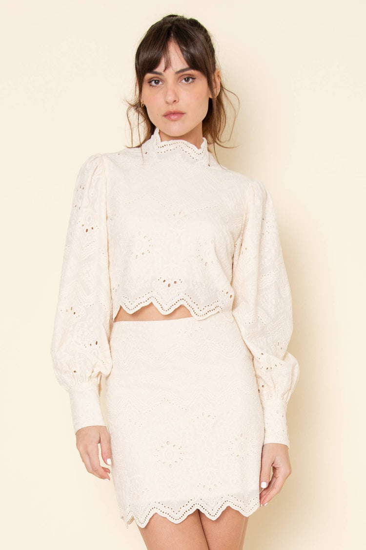 MOCK EMBROIDERED PATTERN BACK ZIP CROP TOP