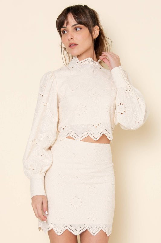 MOCK EMBROIDERED PATTERN BACK ZIP CROP TOP